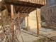 Covered back porch area for relaxing, with a view of the home's backyard at 2746 E 132Nd Pl, Thornton, CO 80241