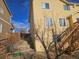 View of the backyard and side of two story home from lawn at 2746 E 132Nd Pl, Thornton, CO 80241