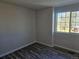 Bright bedroom featuring wood-look flooring and neutral walls at 2746 E 132Nd Pl, Thornton, CO 80241