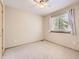 Comfortable bedroom with window overlooking green space at 7659 Lebrun Ct, Lone Tree, CO 80124