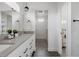 Stylish bathroom featuring double vanity, stone countertop, and modern lighting at 1322 Raleigh St, Denver, CO 80204