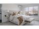Bright bedroom with large window and comfortable furnishings at 1322 Raleigh St, Denver, CO 80204