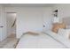 Serene bedroom with soft neutral tones and minimalist decor, providing a calm and relaxing atmosphere at 1322 Raleigh St, Denver, CO 80204