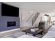 Bright living room showcasing an open floor plan, modern stairs, and seamless flow into the kitchen at 1322 Raleigh St, Denver, CO 80204