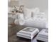Inviting living room features a comfortable white sofa, decorative pillows, and stylish coffee table decor at 1322 Raleigh St, Denver, CO 80204