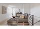 Comfortable living room featuring sectional sofa, hardwood floors, and stylish decor at 1322 Raleigh St, Denver, CO 80204