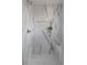 Elegant marble shower with a built-in niche and sleek fixtures at 1322 Raleigh St, Denver, CO 80204