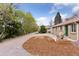 Charming brick home with great curb appeal, featuring a well-maintained front yard and inviting entryway at 3715 Wolff St, Denver, CO 80212