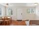 Bright living area features hardwood floors, modern ceiling fan, and a cozy sofa at 3715 Wolff St, Denver, CO 80212