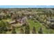 Aerial shot displays a lush green homesite with tall trees, mature landscaping and neighborhood views at 4480 S Franklin St, Cherry Hills Village, CO 80113