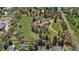 Aerial view of the estate highlighting the property lines, home, trees, and surrounding land at 4480 S Franklin St, Cherry Hills Village, CO 80113