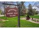 Entrance sign for Cherry Hills Village, set among lush greenery and manicured landscaping at 4480 S Franklin St, Cherry Hills Village, CO 80113