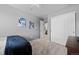 Neutral bedroom featuring carpet, a closet, and decorative artwork at 3917 Starry Night Loop, Castle Rock, CO 80109