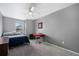 This cozy bedroom features neutral paint and carpeted floors at 3917 Starry Night Loop, Castle Rock, CO 80109