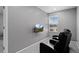 Cozy den featuring comfortable seating, a TV, and a window at 3917 Starry Night Loop, Castle Rock, CO 80109