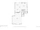 First floor layout featuring a spacious living room, kitchen, garage, and laundry area at 3917 Starry Night Loop, Castle Rock, CO 80109