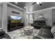 Inviting living room with stylish decor, comfortable seating, and a media center at 3917 Starry Night Loop, Castle Rock, CO 80109
