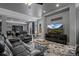 Comfortable living room with a large TV, furniture, and decor at 3917 Starry Night Loop, Castle Rock, CO 80109