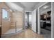 This bathroom features a glass shower, toilet, and walk-in closet at 3917 Starry Night Loop, Castle Rock, CO 80109