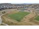 An aerial view showcases a multi-purpose sports field in a well maintained community at 3917 Starry Night Loop, Castle Rock, CO 80109