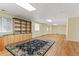 Finished basement with shelving, storage cabinets, and plenty of open recreational space at 6900 W Grant Ranch Blvd # 59, Littleton, CO 80123