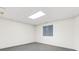 Finished basement with window offering natural light and carpet at 6900 W Grant Ranch Blvd # 59, Littleton, CO 80123