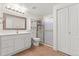 This bathroom features a large vanity with lots of storage, as well as a linen closet at 6900 W Grant Ranch Blvd # 59, Littleton, CO 80123