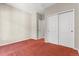 Neutral bedroom with double closets and plenty of space at 6900 W Grant Ranch Blvd # 59, Littleton, CO 80123