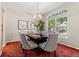 Dining room features a modern chandelier and bright natural light at 6900 W Grant Ranch Blvd # 59, Littleton, CO 80123