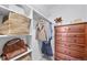 Organized walk-in closet with shelves, hanging space, and a dresser for efficient storage solutions at 7072 Palisade Dr, Highlands Ranch, CO 80130