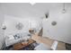 Open-concept living space with stairs, wood floors, high ceilings, and modern decor with lots of light at 7072 Palisade Dr, Highlands Ranch, CO 80130