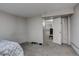 A simple bedroom with an open doorway leading into another space. Carpeting throughout at 841 Crisman Dr # 9, Longmont, CO 80501