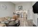 Open-concept living space with vaulted ceilings flows easily into kitchen, creating a bright and airy atmosphere at 841 Crisman Dr # 9, Longmont, CO 80501