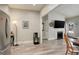 Inviting living area with hardwood floors, neutral paint, flows seamlessly into the modern kitchen at 841 Crisman Dr # 9, Longmont, CO 80501