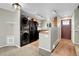 Modern kitchen with stainless steel appliances and wood cabinets at 5930 W 41St Ave, Wheat Ridge, CO 80212