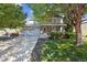 Charming two-story home with stone accents, mature trees, and an attached two car garage at 14625 Vine St, Thornton, CO 80602