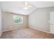 Bright main bedroom featuring neutral paint colors and carpet at 14625 Vine St, Thornton, CO 80602