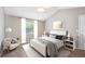 Cozy primary bedroom with vaulted ceiling, a queen-sized bed, and neutral tones with window view at 14625 Vine St, Thornton, CO 80602