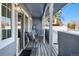 Cozy covered patio with seating, string lights, and privacy fence is perfect for relaxing outdoors at 10634 Park Mtn, Littleton, CO 80127