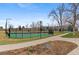 Enjoy a game of tennis on the community court with lights for evening play and mountain views at 10634 Park Mtn, Littleton, CO 80127