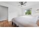 Well-lit bedroom with hardwood floors and a large window at 3380 S Ogden St, Englewood, CO 80113