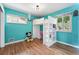 Bright bedroom with lofted bed, desk area, and views from two windows at 3380 S Ogden St, Englewood, CO 80113