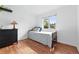 Cozy bedroom with hardwood floors and a window view at 3380 S Ogden St, Englewood, CO 80113