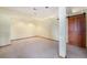 Finished basement room with recessed lighting and a large barn door at 497 Grey Squirrel Way, Franktown, CO 80116