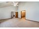 The spacious main bedroom offers vaulted ceilings and dual access to an ensuite bathroom and walk in closet at 497 Grey Squirrel Way, Franktown, CO 80116