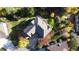 Aerial view of the house featuring the backyard with patio and surrounding landscape at 22386 E Arbor Pl, Aurora, CO 80016