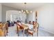 Open-concept dining room and living room, perfect for entertaining guests at 22386 E Arbor Pl, Aurora, CO 80016