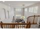 Grand foyer featuring high ceilings, staircase, and ample natural light at 22386 E Arbor Pl, Aurora, CO 80016