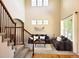 Bright and airy living room with large windows, high ceilings, and modern decor at 22386 E Arbor Pl, Aurora, CO 80016