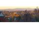 Scenic view of residential area and mountains in the distance during sunset at 22386 E Arbor Pl, Aurora, CO 80016